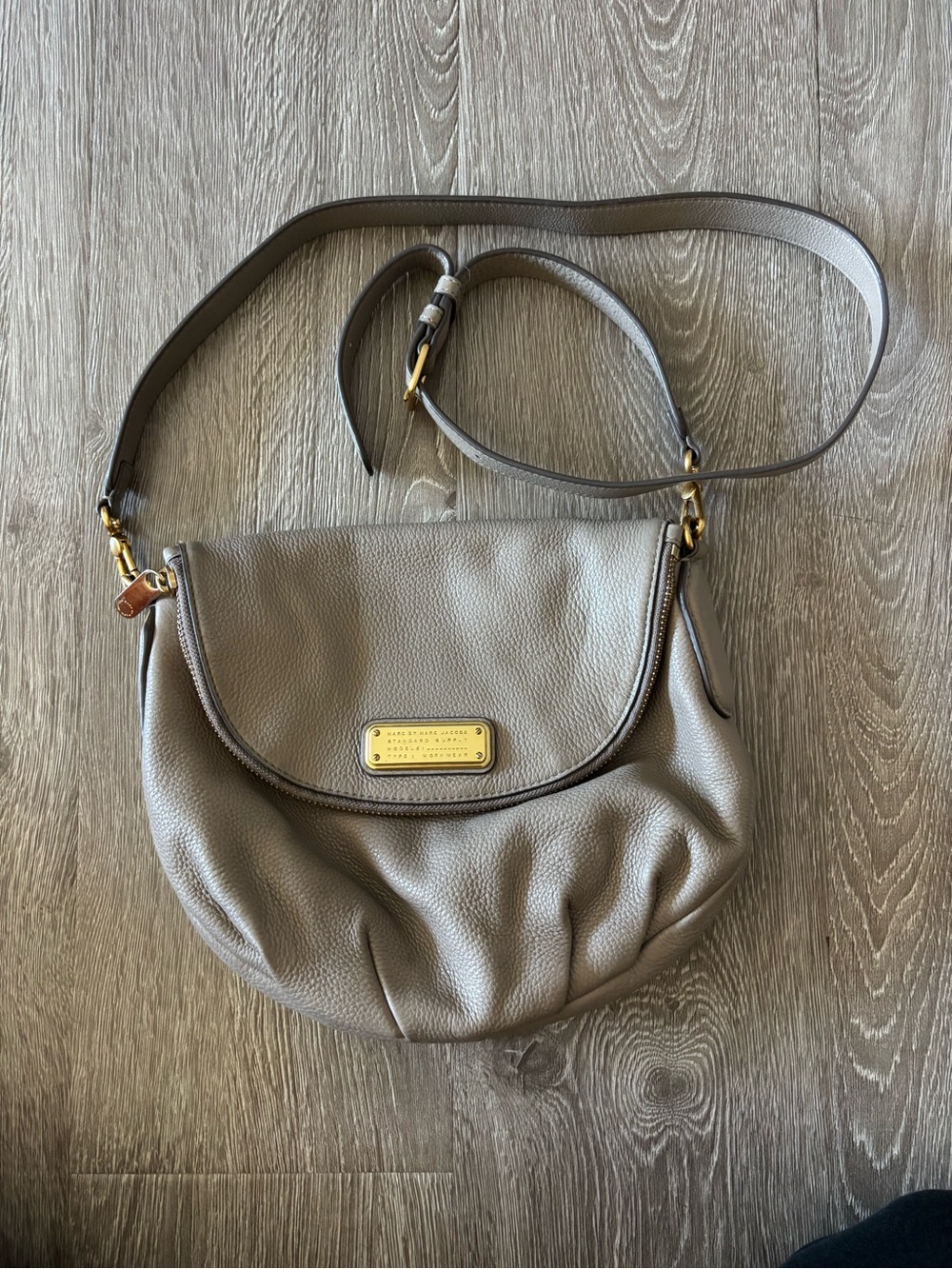 Marc Jacob’s Taupe Leather Crossbody Bag with Gold Plaque